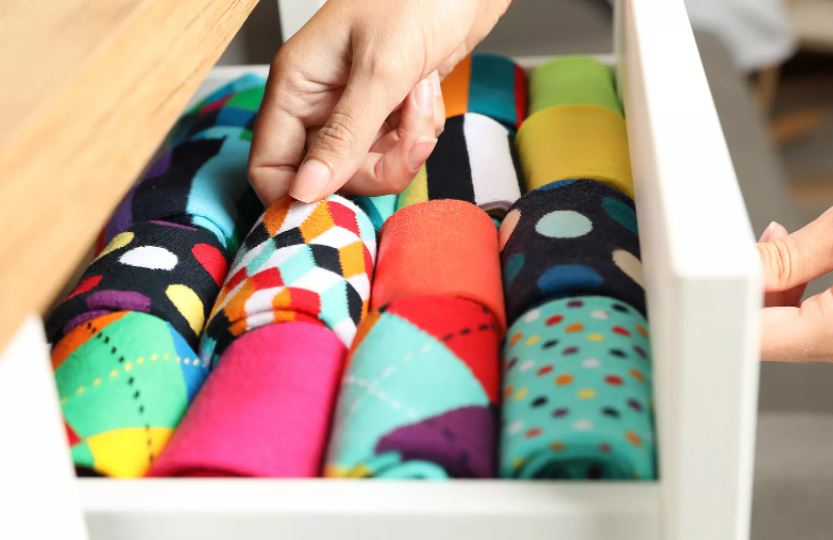 Why Navy Suits and Colorful Socks Work: Building a Personal or Company Brand